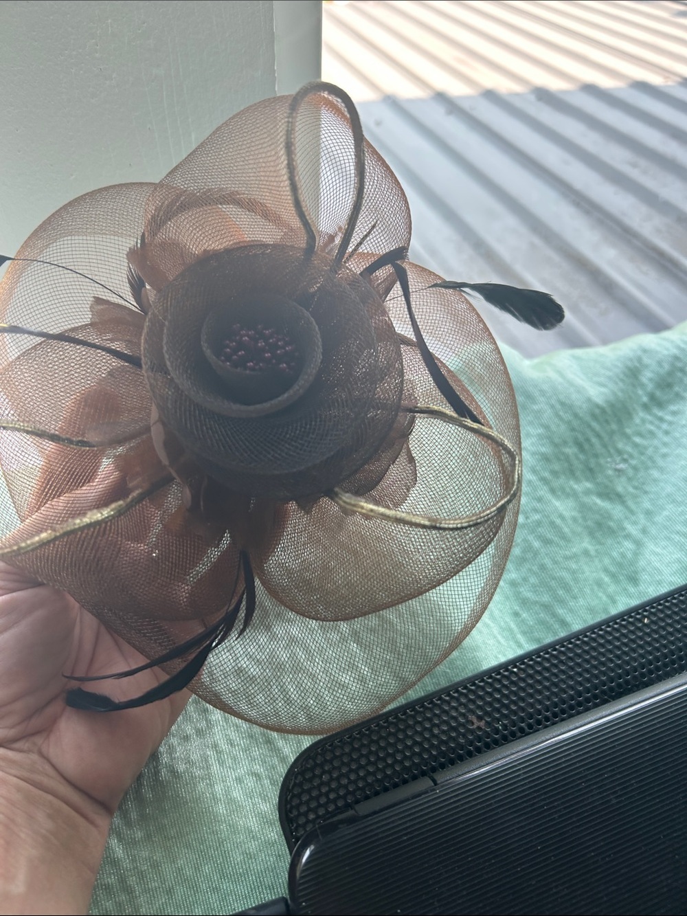 Elegant fascination in brown colours. Classic fascinator with feathers- used